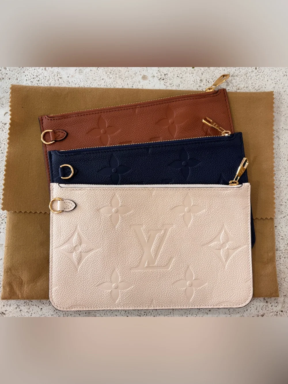 Authentic Louis Vuitton Neverfull GM Empreinte giant monogram pouch wristlet